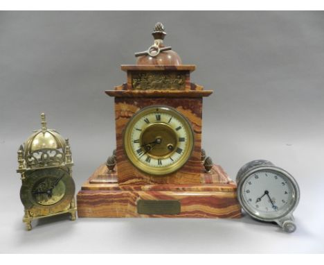A pink veined marble mantle clock retailed by Carter and Sons, Salisbury and Andover with presentation plaque together with a