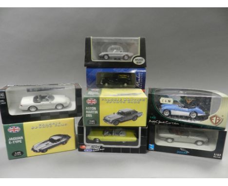 A group of 34 boxed classic cars in 1/43 scale by Cararama Atlas, Dickie Spielzeug and others subjects include Jaguar, Triump