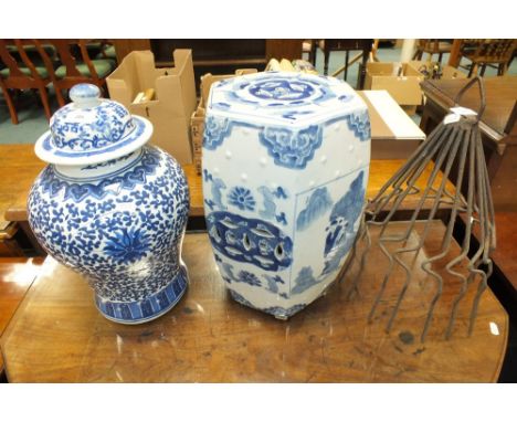 A reproduction Chinese blue and white baluster vase and cover decorated with lotus scrolls 40cm high and a reproduction Chine