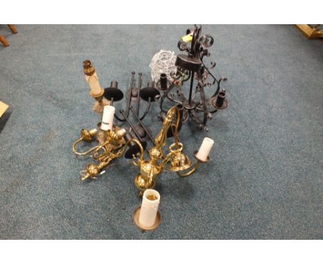 Two boxes containing a selection of modern light fittings including chandeliers, table lamps, and shades 