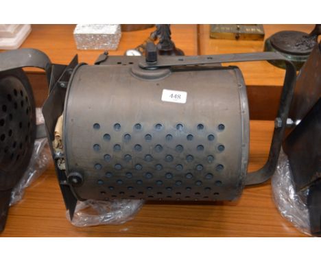 A vintage industrial style spot light and metal bracket