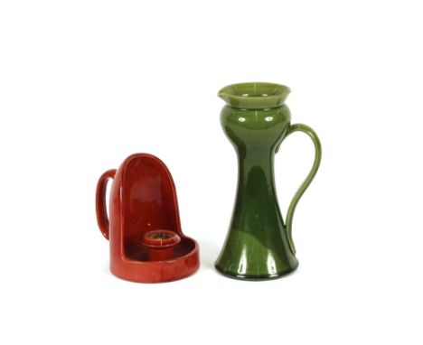 A Bretby pottery red glazed night light; and an Allervale green pottery ewer