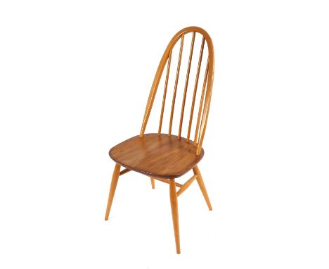 A set of six light Ercol stick back kitchen chairs; together with two medium coloured similar and a dark example