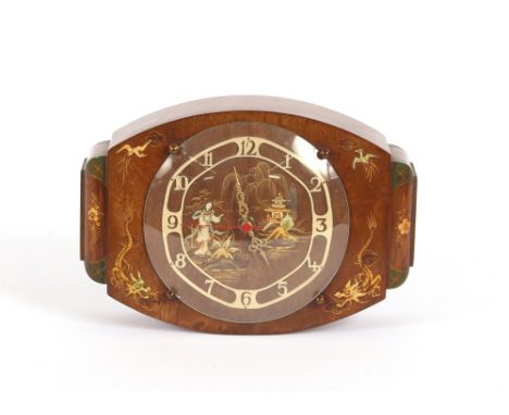 An Art Deco design battery powered mantel clock, decorated in the chinoiserie manner