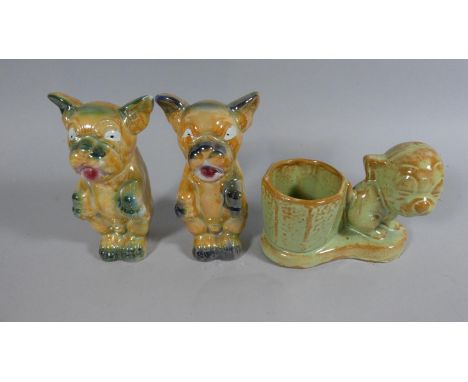 A Collection of Three Glazed Ceramic Bonzo Dog Figures 