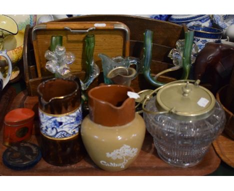 A Tray of Sundries to Include Oak Stationery Rack, Edwardian Crumb Tray, Ceramic Jugs, Glass Biscuit Barrel etc 