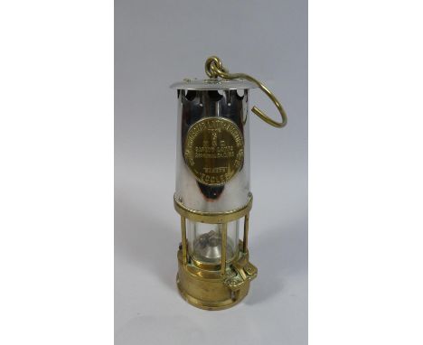 A Brass and Steel Miners Safety by the Protector Lamp and Lighting Company 