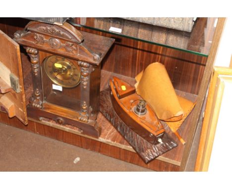 A MANTLE CLOCK TOGETHER WITH A SHIP LAMP