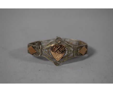 A Silver Filigree Bracelet with 14k Gold Mounts and a Heart Inscribed 'Pauline', Gross Weight 16.5gms 