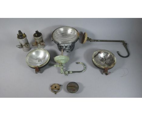 A Vintage Car Headlight, Two Spot Lights, a 'Gas' Cap, Two Ignition Coils and Some Gas Fittings 