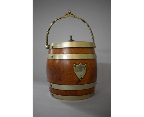 A Silver Plated Banded Biscuit Barrel with Swing Carrying Handle and Ceramic Liner, 15.5cms High 