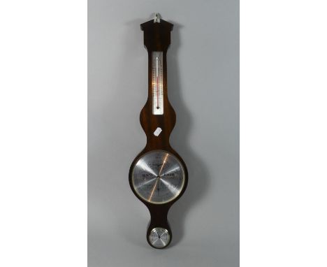 A Modern Mahogany Wheel Barometer with Humidity and Thermometer Scale, 68cms High 