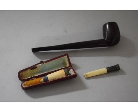 A Silver Mounted Cheroot Holder Together with a Cased Amber Example (AF) and a Pipe 