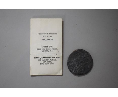 A Shipwreck Dutch Silver Rider/Ducaton Recovered from the Hallandia Contained within Sotheby &amp; Co. Paper Wallet/Pouch