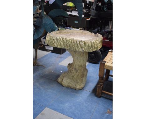 A Reconstituted Stone Bird Bath in the Form of Tree Trunk, 44cms High 