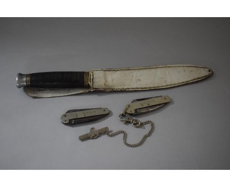 A Vintage Scout's Dagger in Leather Sheath Together with Two Girl Guides Pocket Knives 