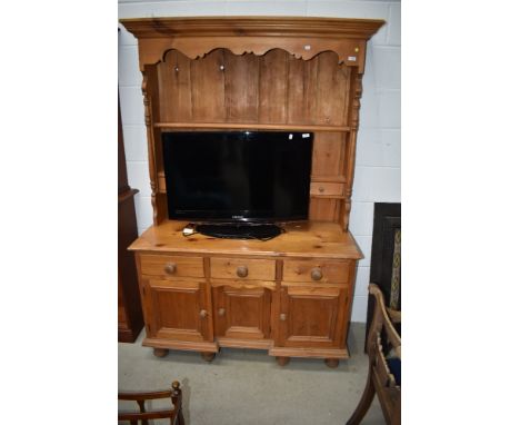 A vintage dresser in natural pine