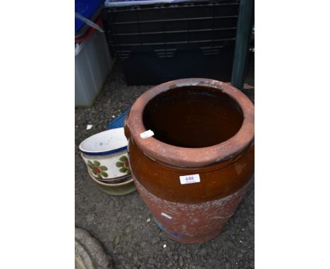 A vintage crock (no lid) and two continental style planters