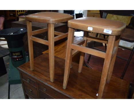 A pair of vintage kitchen stools