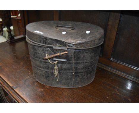 A vintage tin hat box