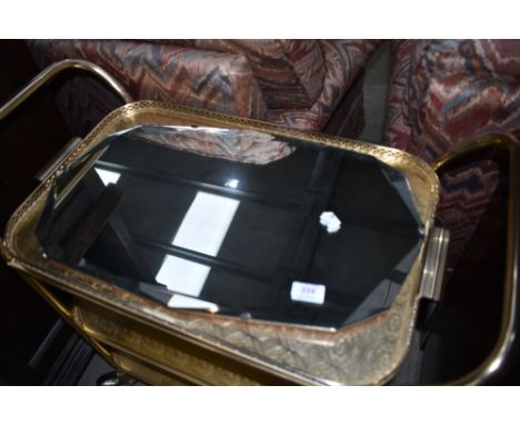 A vintage frameless wall mirror, width approx. 56cm