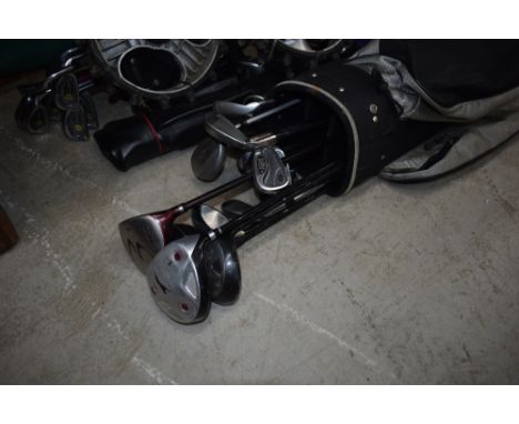 A selection of golf clubs bags and trolley (electric) etc, clubs include Slazenger, Wilson (Fat Shaft Titanium) etc