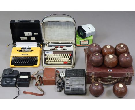 A set of eight lignum vitae lawn bowls, cased; two portable typewriters; &amp; sundry other items.