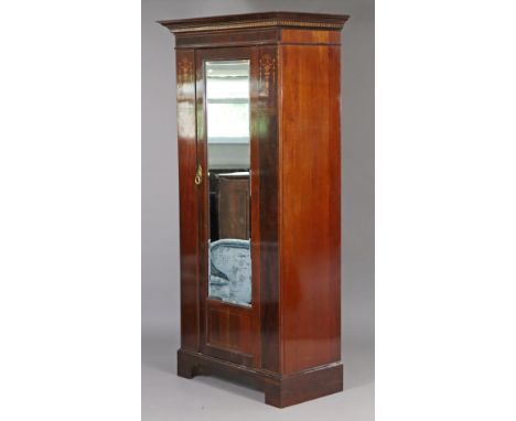 An Edwardian inlaid-mahogany bedroom pair comprising a single wardrobe, with moulded cornice above a hanging compartment encl