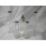 Two pairs of silver topped vases and a silver topped sugar sifter.