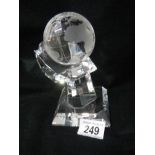 A superb quality crystal glass globe on rotating stand.