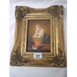 A gilt framed study of a lady.