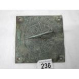An old brass sundial.