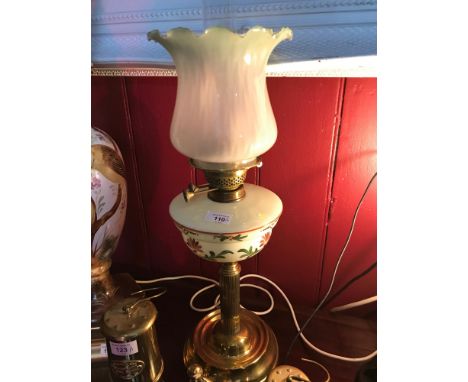 A Victorian Falk Stadelmann &amp; Co Paraffin brass and glass lamp. Hand painted flower design, finished with a frosted glass