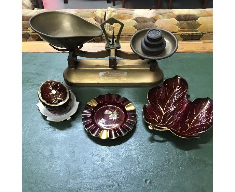 A Vintage kitchen weighing scales with weights together with 4 pieces of Carlton ware Rouge Royale. 