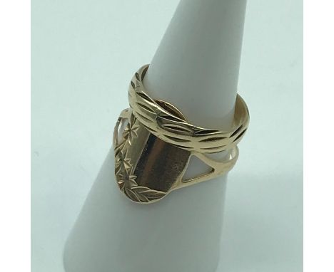 A lot of two 9ct gold rings. One is a Wedding band designed with cuts and the other is a signet/ I.D Ring. Total weight 3.60g