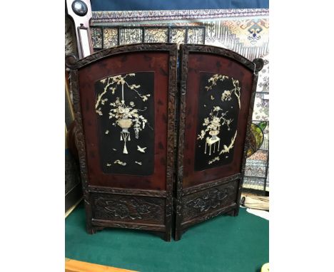 Antique Chinese small two fold screen, designed with raised relief mother of pearl and bone urns and birds. Measures 76cm in 