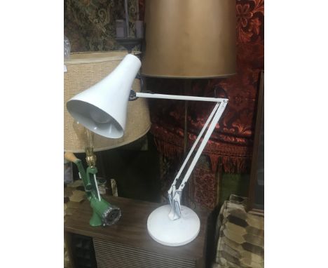A Vintage industrial angle poise lamp. In a working condition.