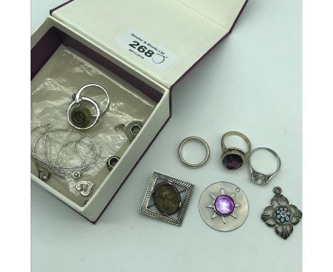 A Lot of silver sterling jewellery and various costume. Includes 3 silver rings, Silver cameo brooch &amp; silver necklace. 