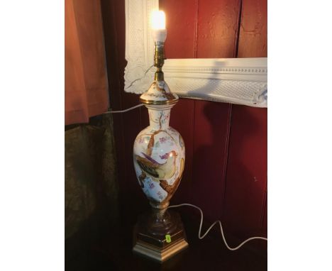 A Large Antique porcelain hand painted table lamp, depicting two birds. Measures 68cm in height. In a working condition. 