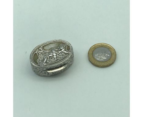 A Sterling silver 925 pill brooch depicting cherub figure in chariot with two lions to the lid. 