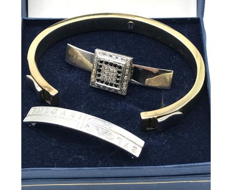 A Stunning Designer BVLGARI 14ct gold bangle with replacement Sapphire &amp; Diamond section. Total weight is 37.54grams