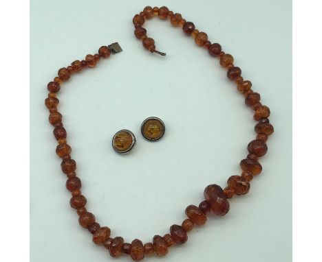 Antique amber graduating bead necklace, together with a Sterling 925 silver earrings set with amber. 