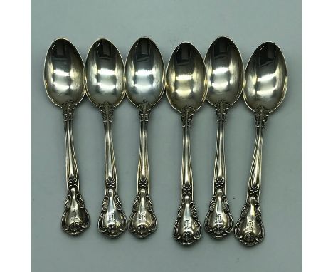 A Set of 6 heavy Sterling Silver spoons. 