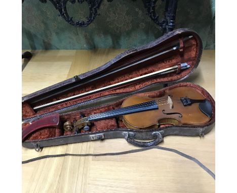 An Antique Violin, two bows and case. Violin is manufactured by The Carrodus Violin Company dated 1910 No K75. Comes with a J