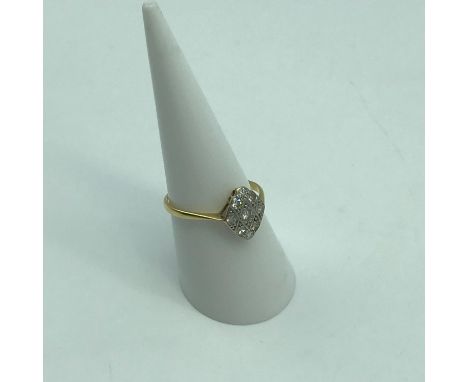 A Beautiful ladies 18ct gold &amp; Platinum ring set with 9 various sized diamonds. Designed in an Art Deco manner. Ring size