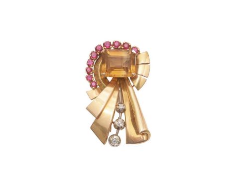 A mid-20th Century citrine, ruby and diamond fur clip brooch, of Art Deco style, the rectangular step-cut citrine measuring 1