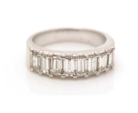 An eight stone diamond ring, the baguette cut diamonds weighing a total of approximately 0.80 carats, in platinum mount and s