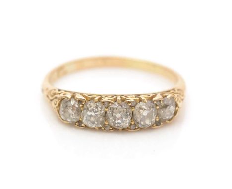 A Victorian five stone diamond ring, the old-cut diamonds set within rose-cut point-diamonds, in yellow gold scrolling mount 