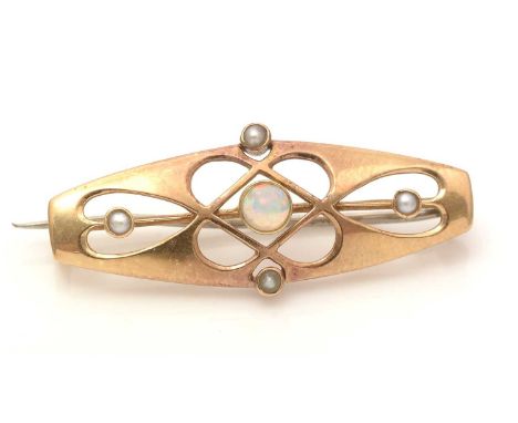 Murrle Bennett Co: a 15ct yellow gold Art Nouveau brooch, centred by a circular opal cabochon surrounded by seed pearls in pi