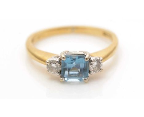 An aquamarine and diamond ring, the square single-cut aquamarine 5.0 x 5.0 x 3.7mm, flanked by two brilliant-cut diamonds, in